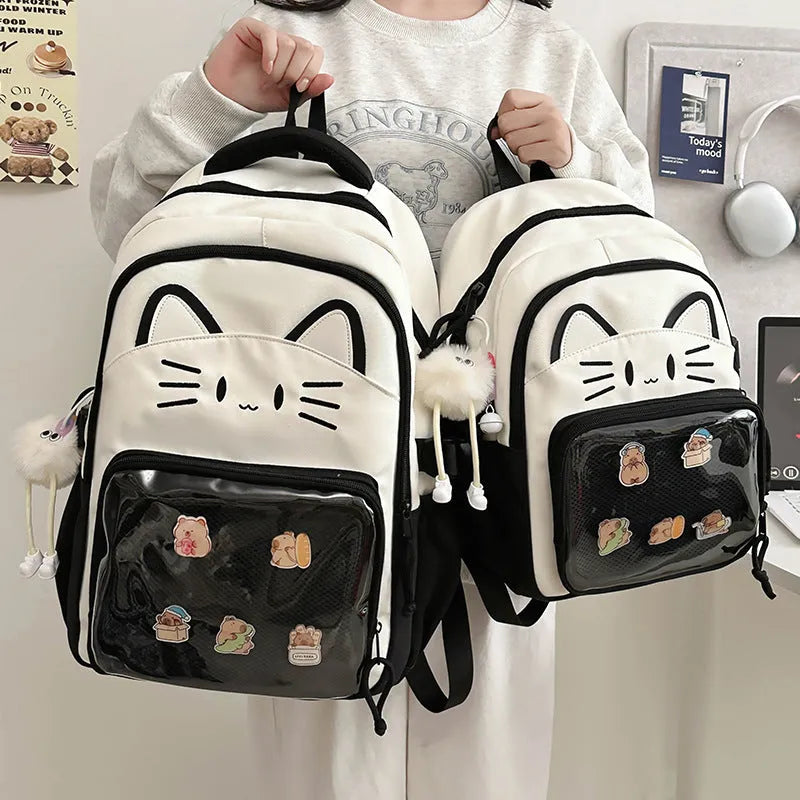 Korean cartoon backpack in multiple colours with curved shoulder straps and badge pendant options