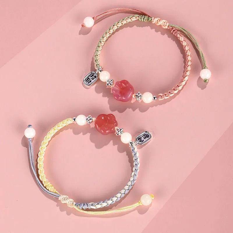 Red cat's paw woven bracelet handmade from glass and coloured glaze in pink or yellow couple style