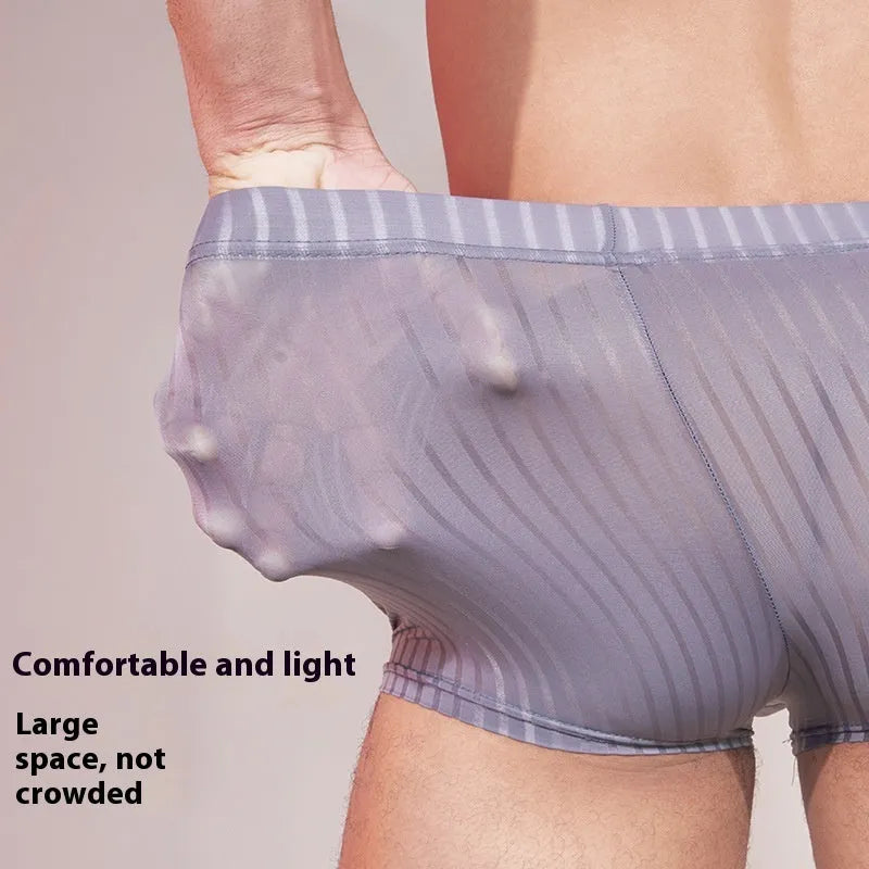 Men's striped underwear in thin nylon fabric, shown in black, white, and dark grey colours.