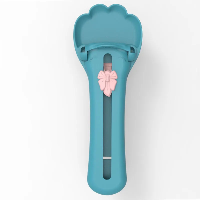 Green and pink pet feed spoon with extrusion design and squeezer feeder function for cat treats and liquid foods