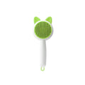 Self-cleaning cat grooming brush with stainless steel tines in greenish white colour