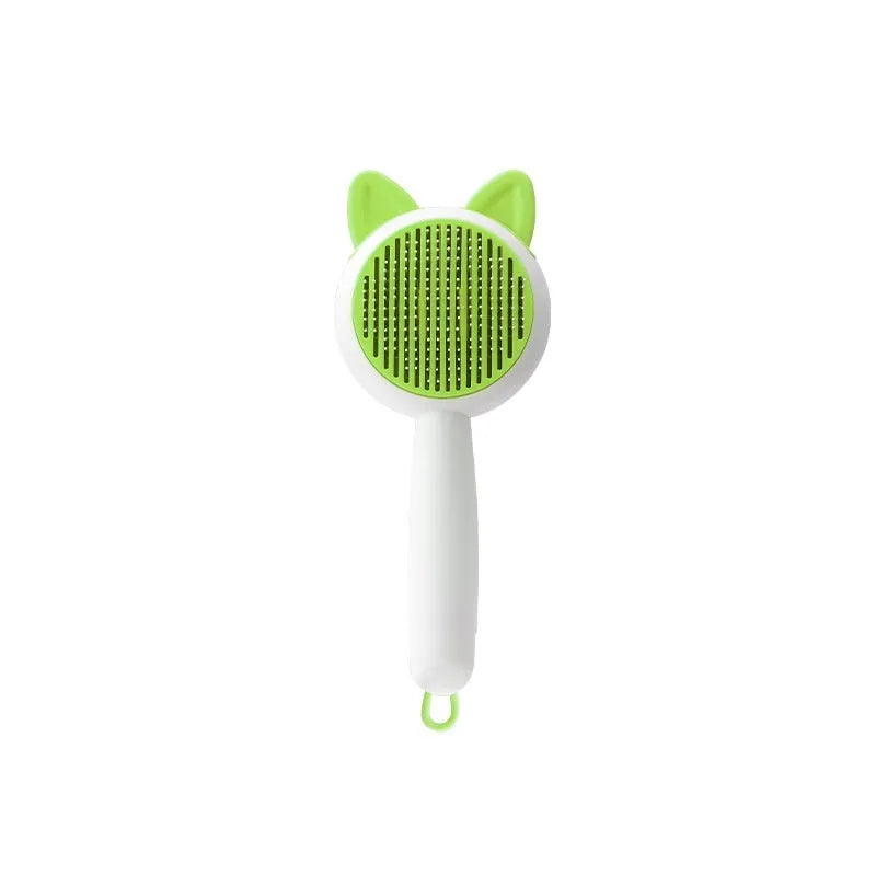 Self-cleaning cat grooming brush with stainless steel tines in greenish white colour