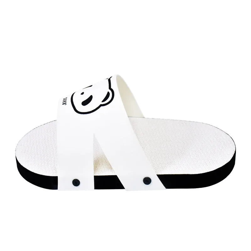 White slipper-shaped corrugated paper cat scratch board on a floor