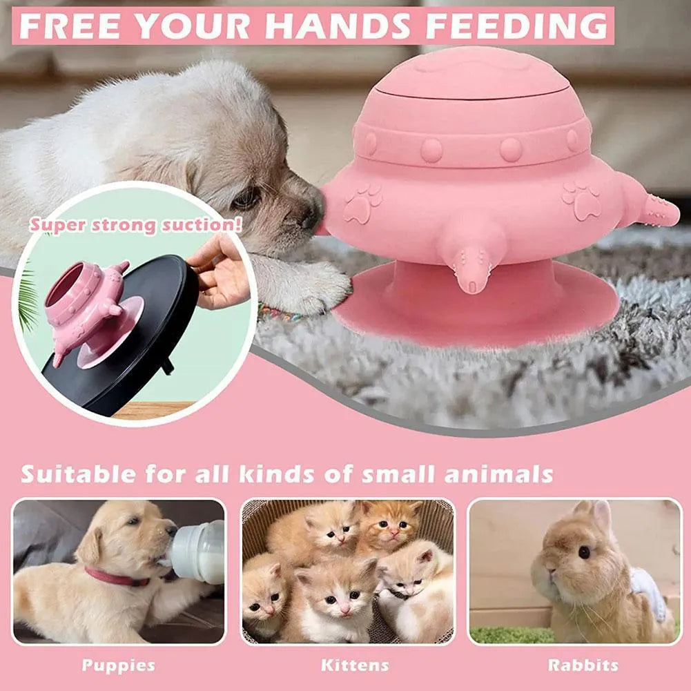 Pink silicone pet nursing device with pacifiers for feeding puppies and kittens.