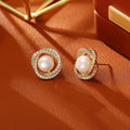 Natural pearl winding ear studs with real gold plating on copper base, geometric round shape