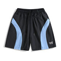 Quick-drying black and grey sports shorts with elastic waist and loose fit design