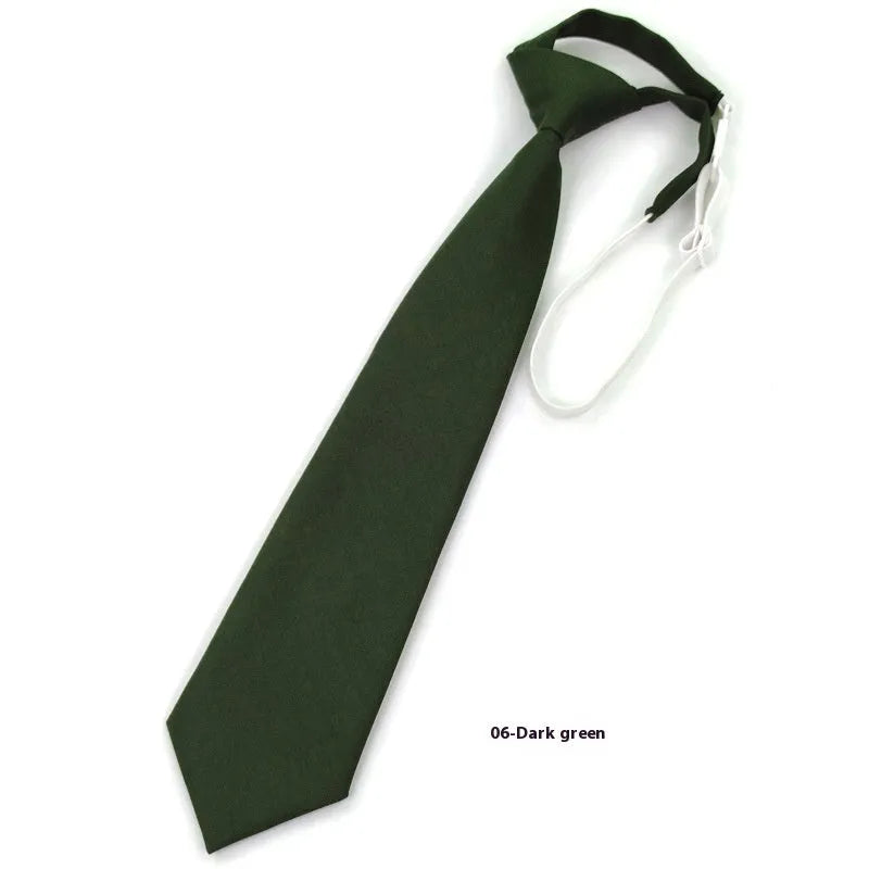 A navy blue cotton men's bow tie with an arrow style design on a white background.