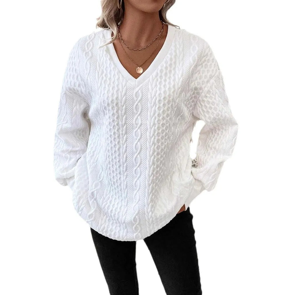 Milky white loose long sleeve T-shirt with a textured 3D pattern on the front.