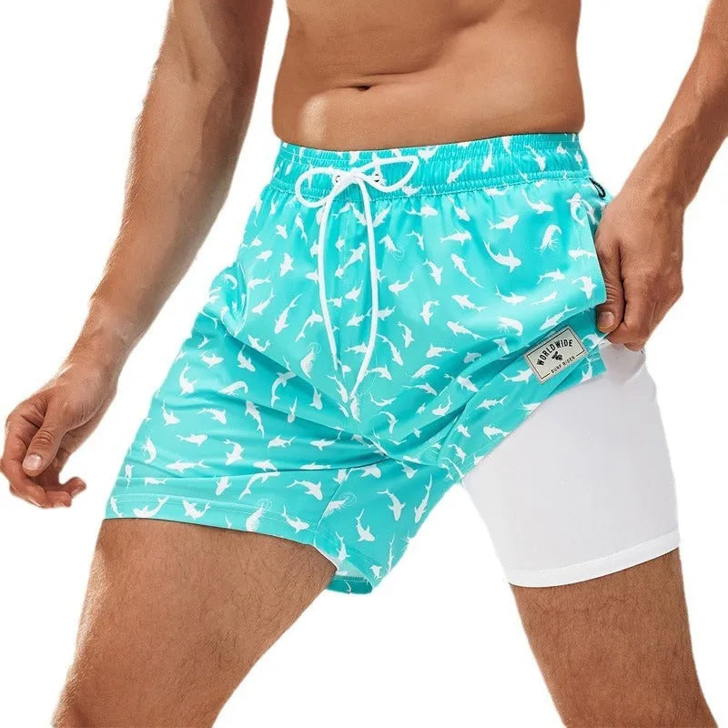 Man wearing loose green boxer-style swimming trunks made from quick-drying spandex fabric.