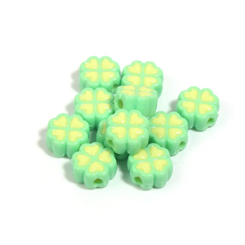 15mm acrylic clover craft beads with frosted finish in multiple colours including pink, blue, yellow, and green
