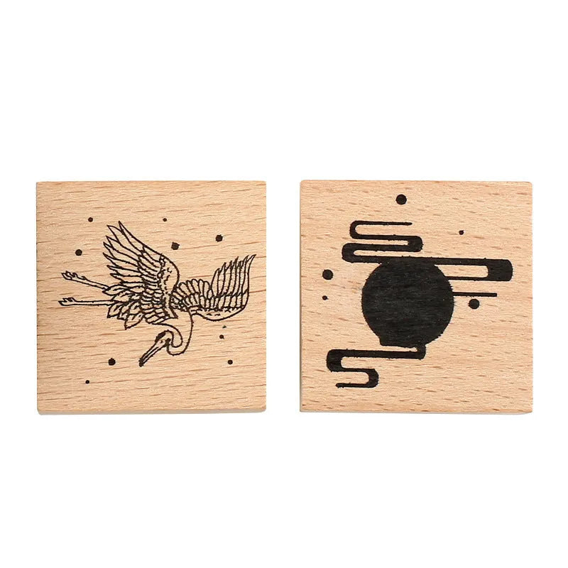 Wooden handled rubber stamp with hand-carved crane design for DIY paper crafting