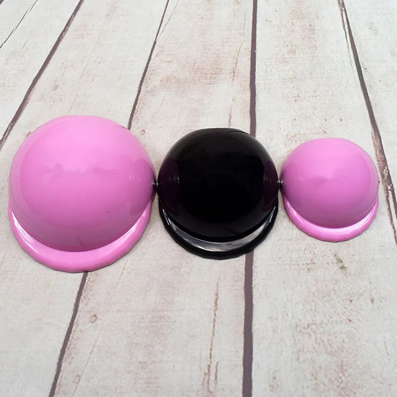 Plastic dog motorcycle cap helmet in a solid colour, shown in small, medium, and large sizes.