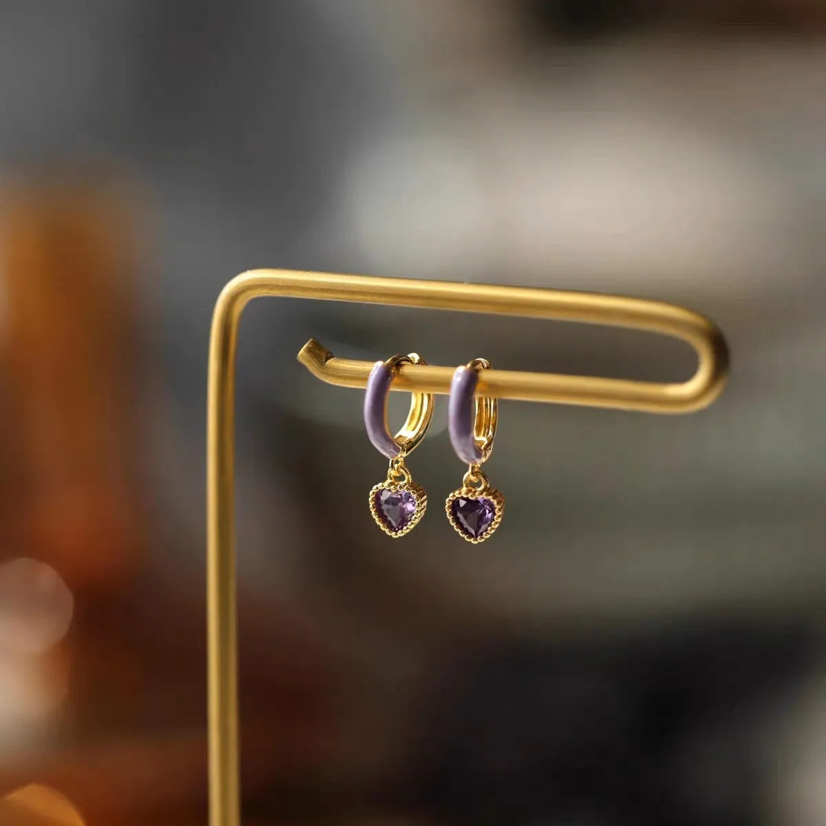 Purple enamel love heart earrings in gold with copper body and geometric bohemian heart design