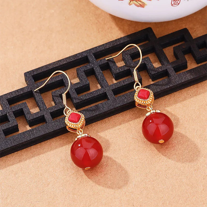 Southern red agate round bead earrings with sterling silver inlaid jasper geometric drop design
