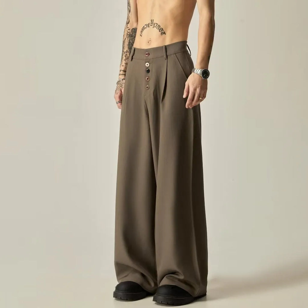 Men's solid black wide-leg casual trousers with a vertical tube cut and button fly.