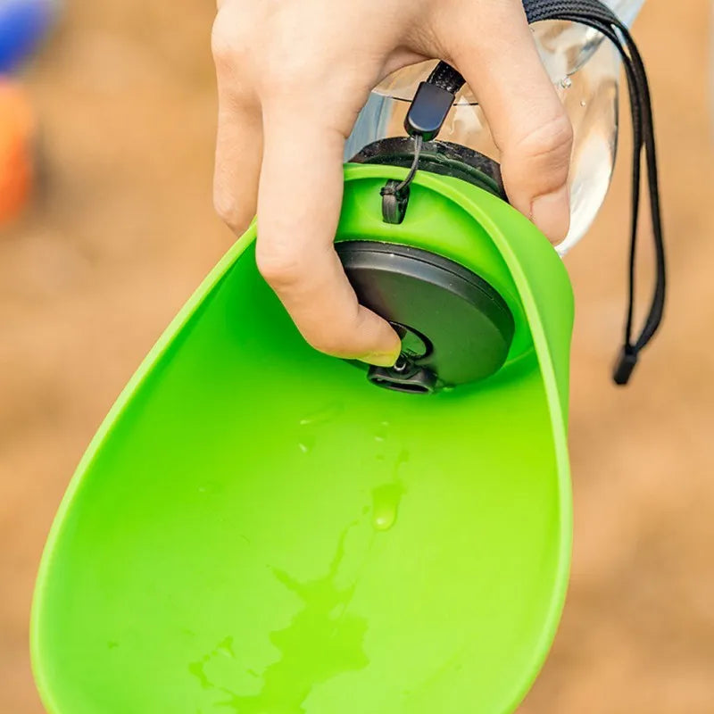 Portable pet water bottle with drinking bowl in blue, green, red, or orange colours