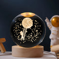 USB-powered luminous crystal ball on wooden base with starry sky or landing moon design