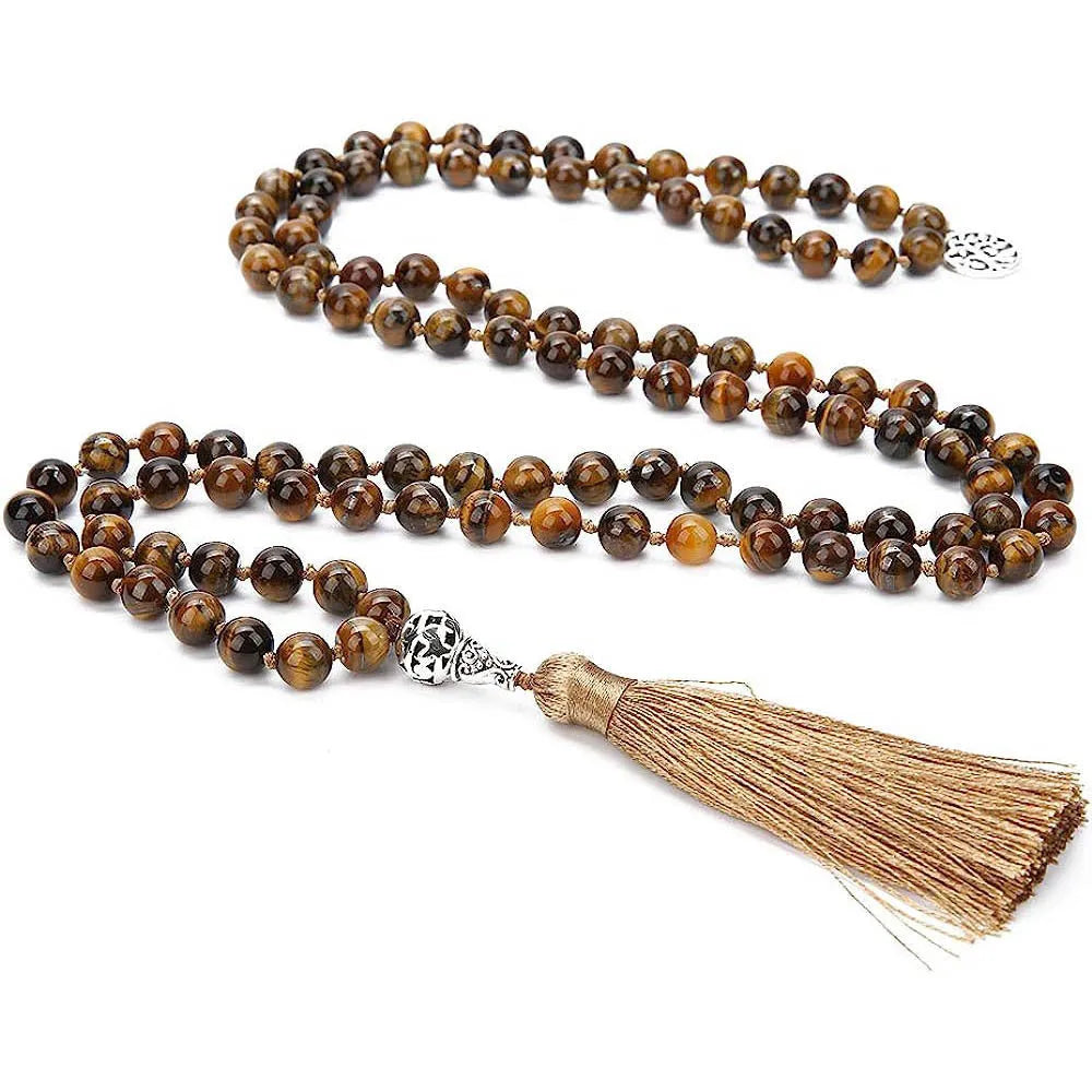 Handmade knotted stone bead necklace with 108 beads, showing geometric design and natural stone colours.