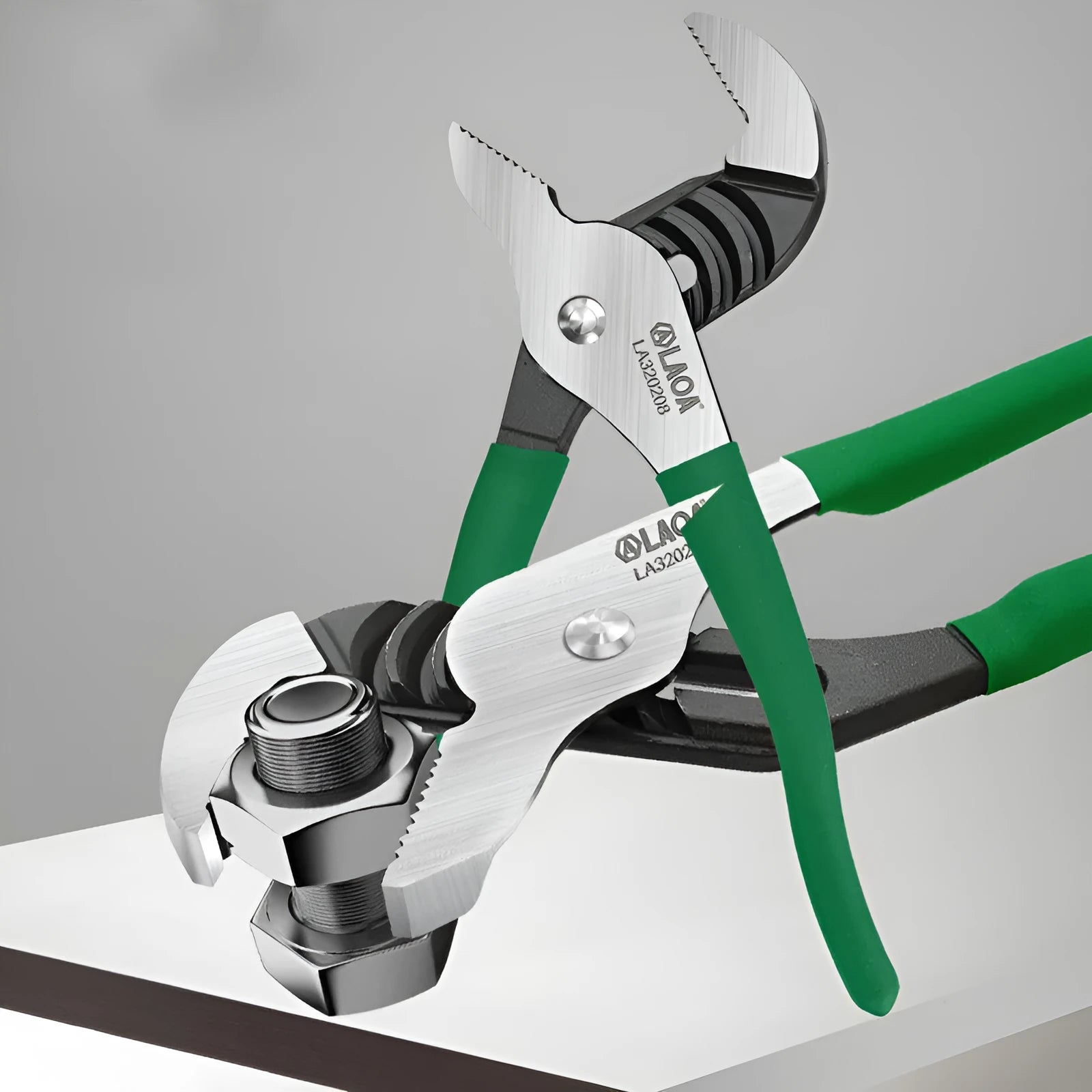 Multi-functional adjustable water pipe wrench in chrome vanadium steel on a workbench.
