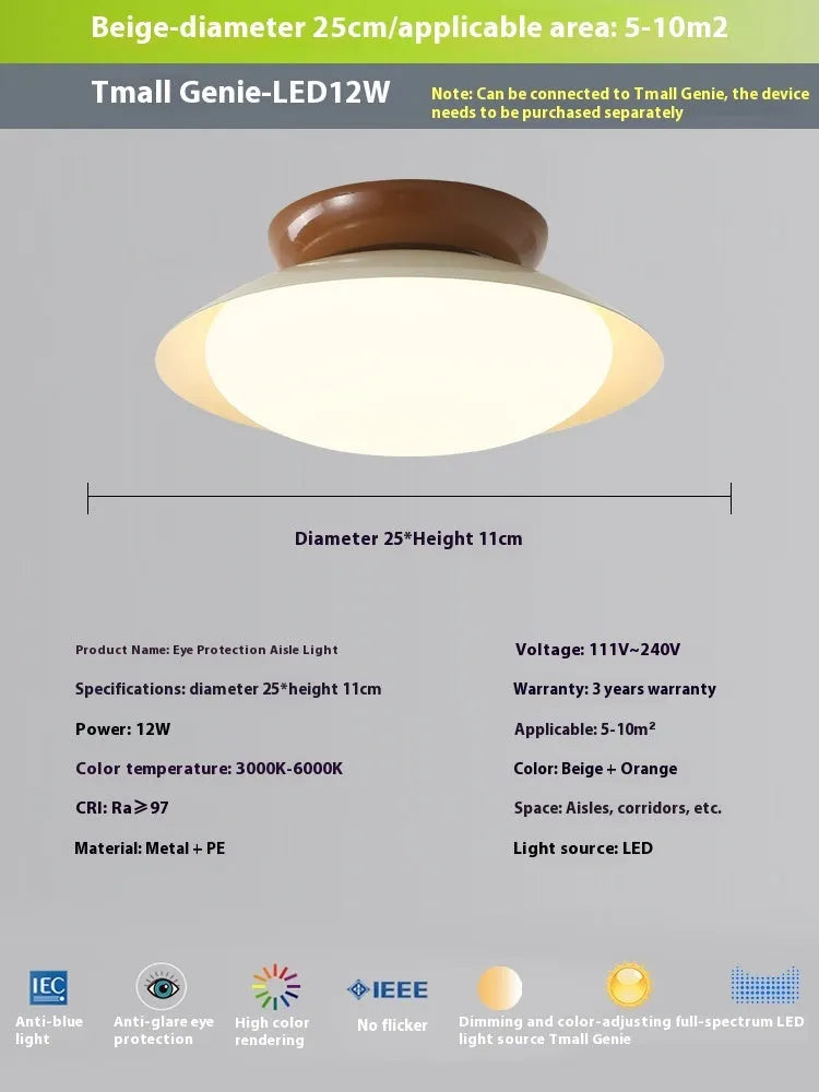 Modern cream style flying saucer shaped ceiling lamp in an iron shade.