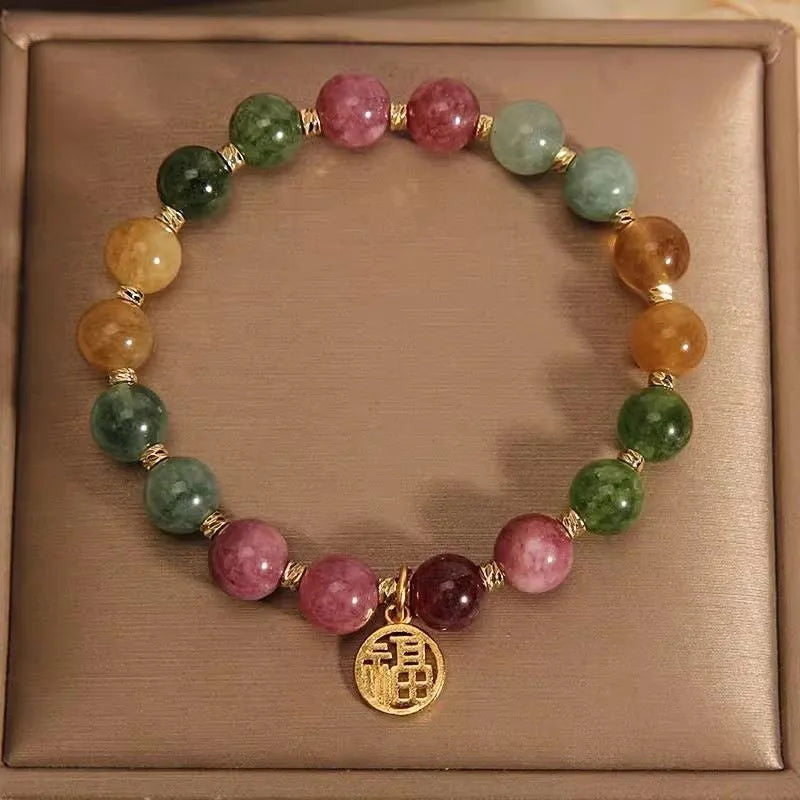 Natural colour tourmaline bracelet with flower design and electroplated finishing