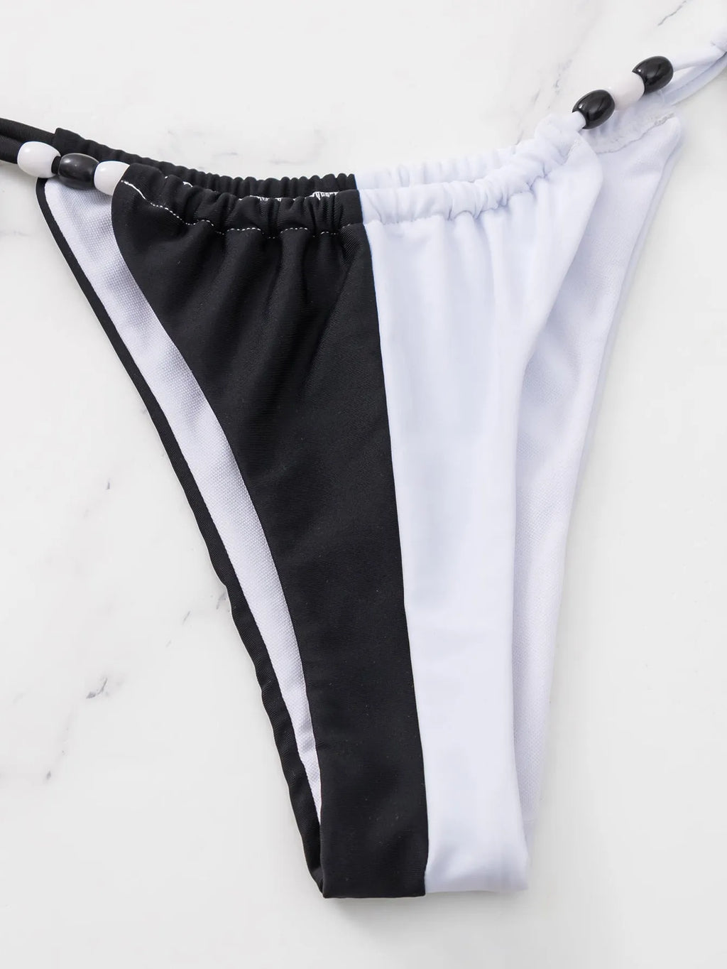 Women's black and white lace-up triangle cup bikini swimsuit with briefs bottom