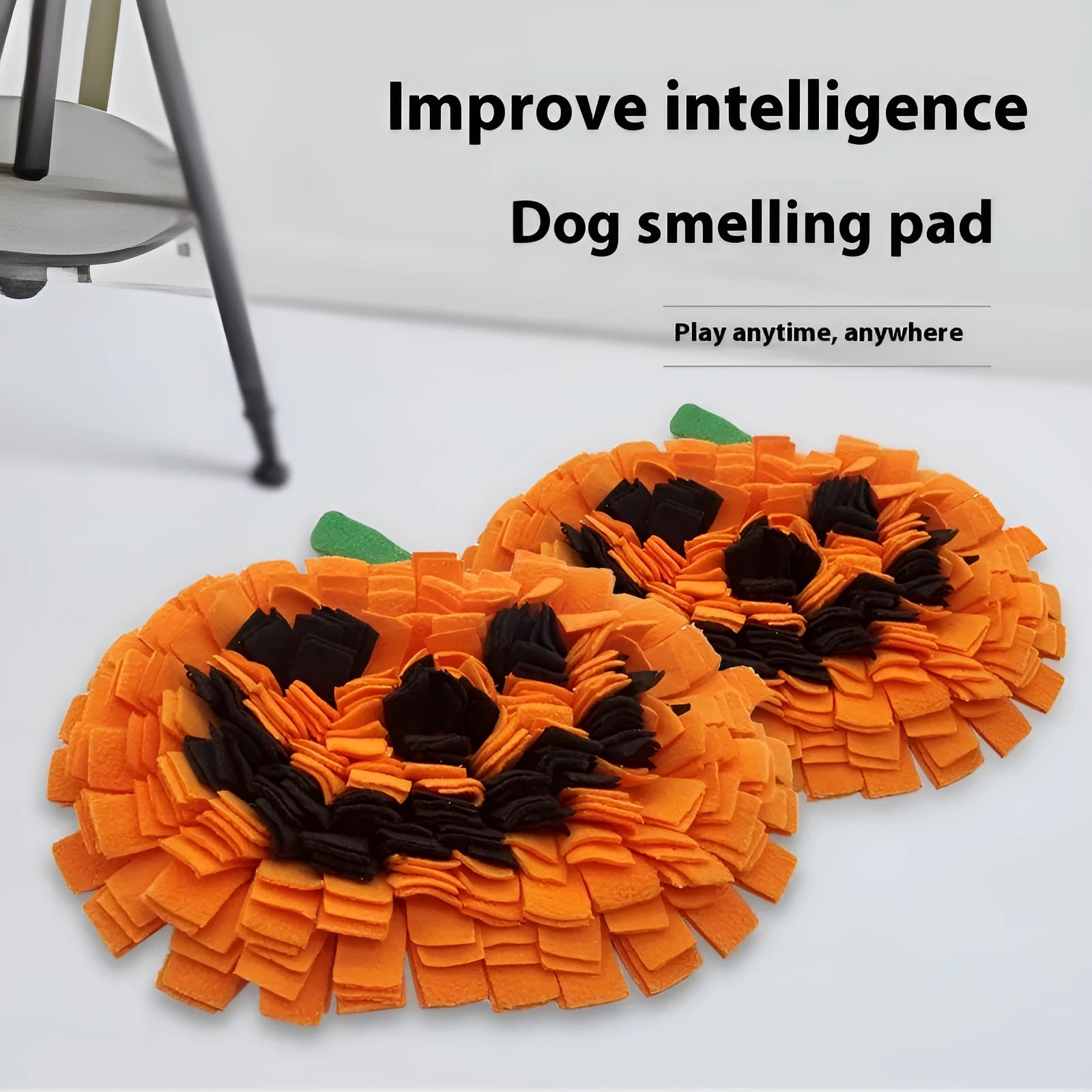 Orange pumpkin-shaped pet training mat with textured fleece surface for slow feeding
