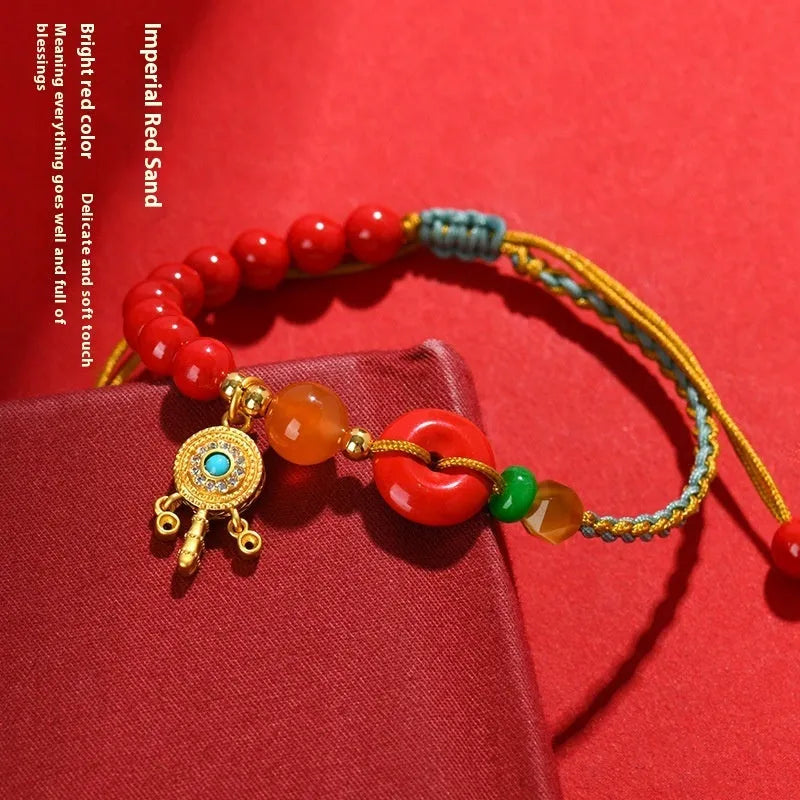 Red hand-woven cinnabar bracelet with geometric peace blessing buckle charm