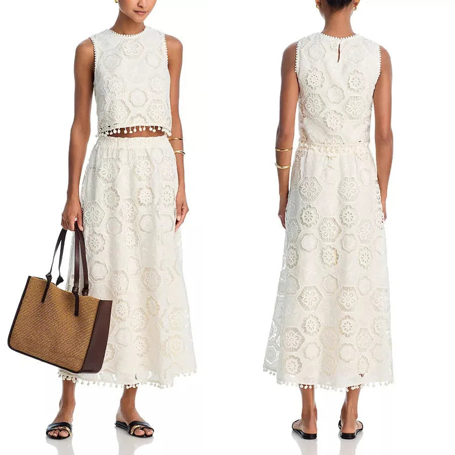 Literary Trends white women's suit with embroidered long skirt and sleeveless top on a hanger