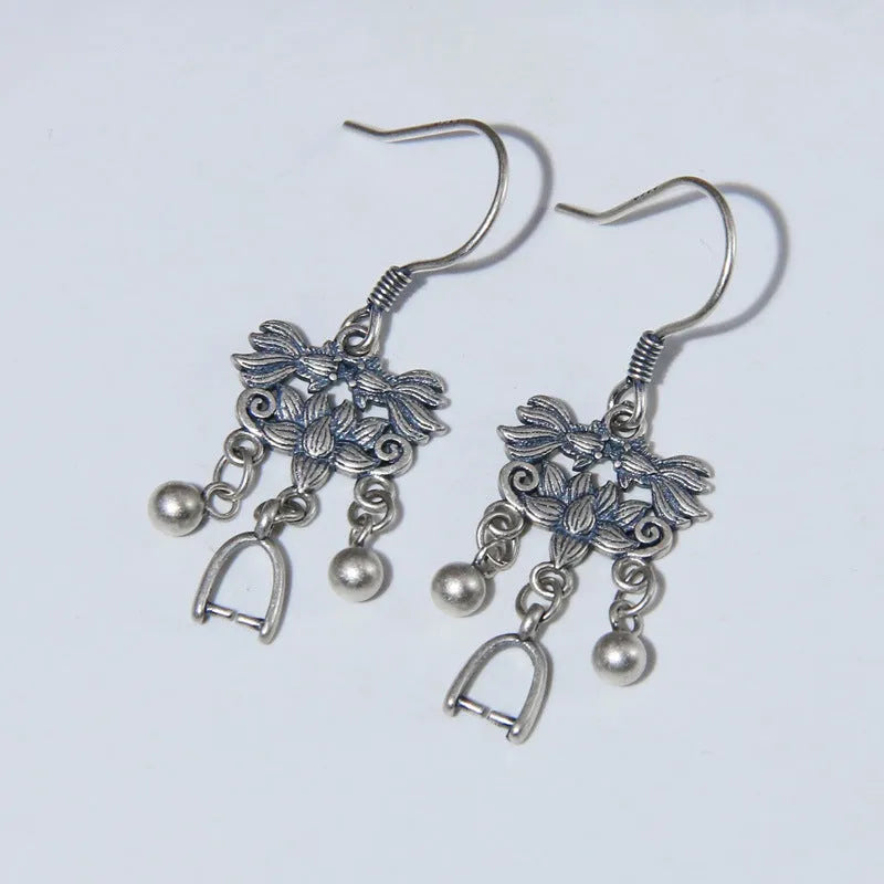 Pair of handmade 925 sterling silver koi earrings with silver colour and drop ear hook design