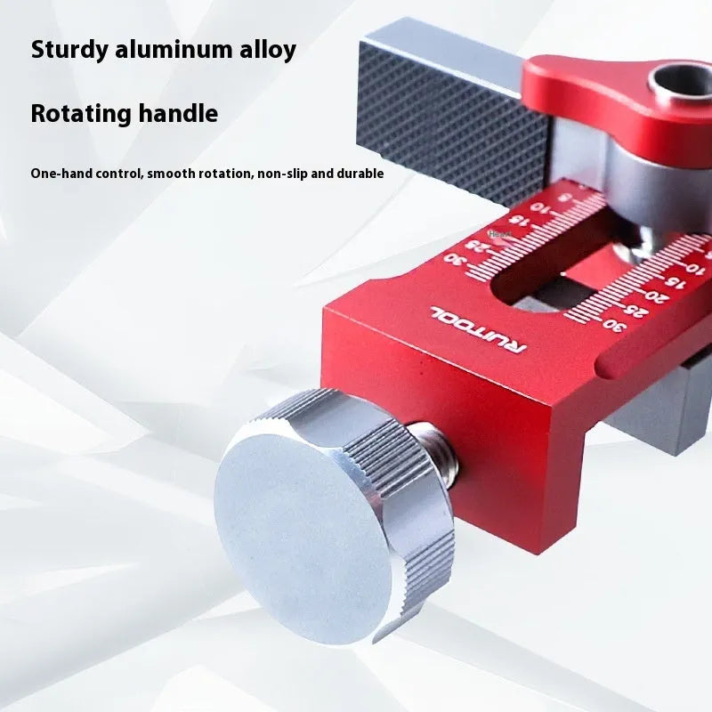 Aluminium alloy cabinet door installation aid tool for woodworking projects on a workbench.