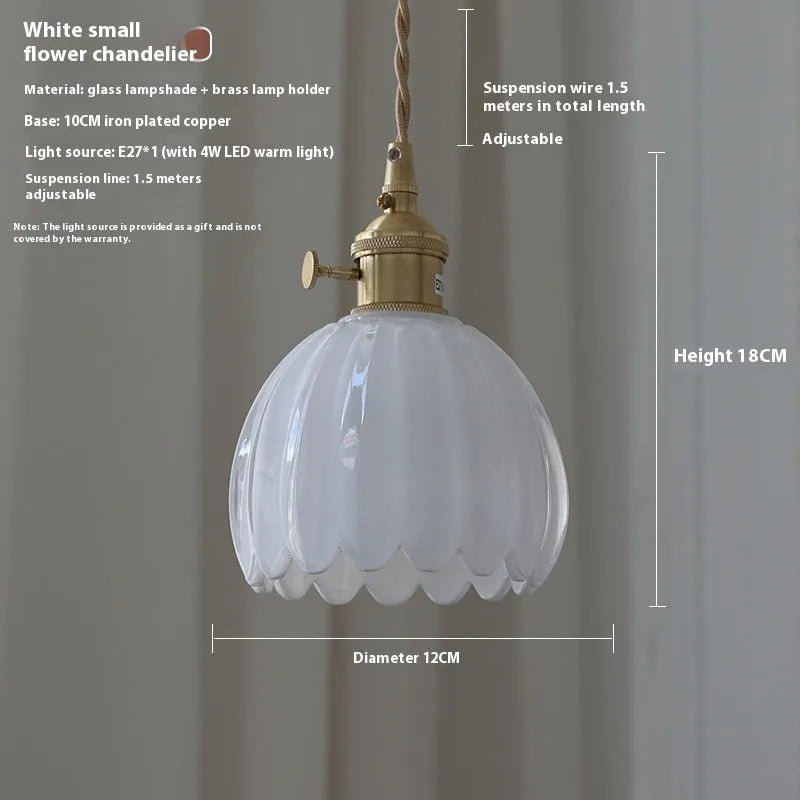Vintage Nordic style glass flower chandelier with coloured shades in bedroom setting
