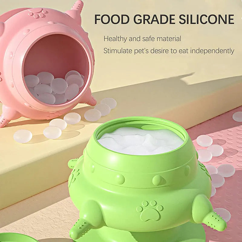 Pink silicone pet nursing device with pacifiers for feeding puppies and kittens.