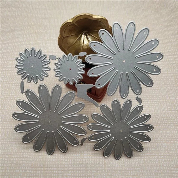 Silver high carbon steel flower combination cutting die mould measuring 12.5 by 13 cm