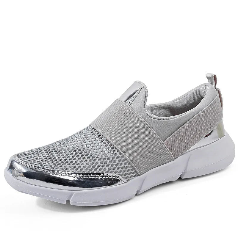 Blue, black, and grey women's lightweight sneakers with mesh lining and low-tube design.