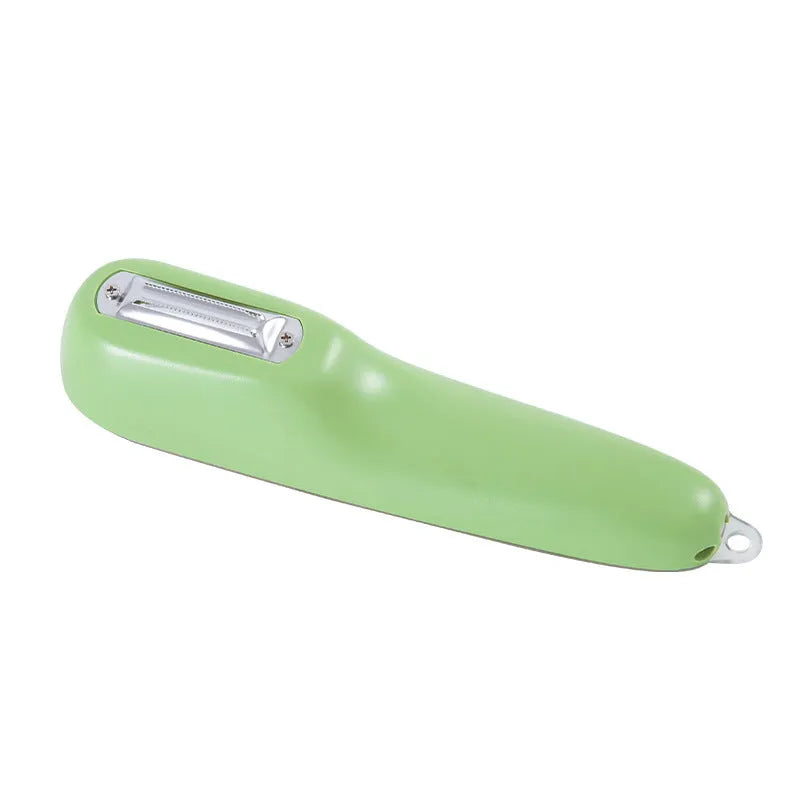Green kitchen peeler with a stainless steel blade stored inside its transparent plastic tube.