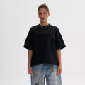 American style loose fit pure cotton T-shirt in apricot colour on a hanger