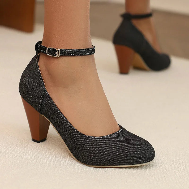 Women's blue denim platform heel boots with buckle fastening and waterproof construction