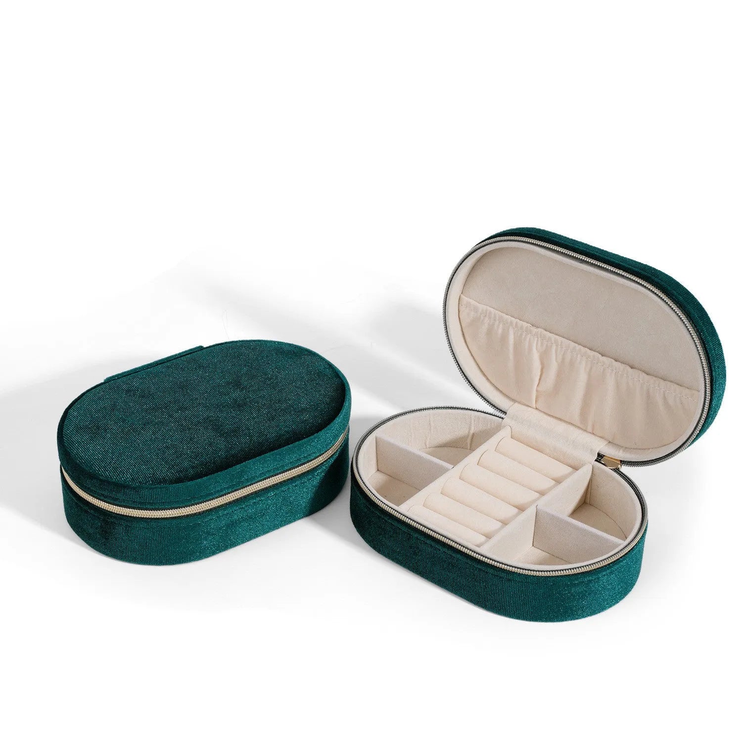 Oval velvet jewellery storage box in lake blue with internal hook for necklaces.