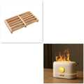 Black USB humidifier with simulated flame effect on a wooden desk.
