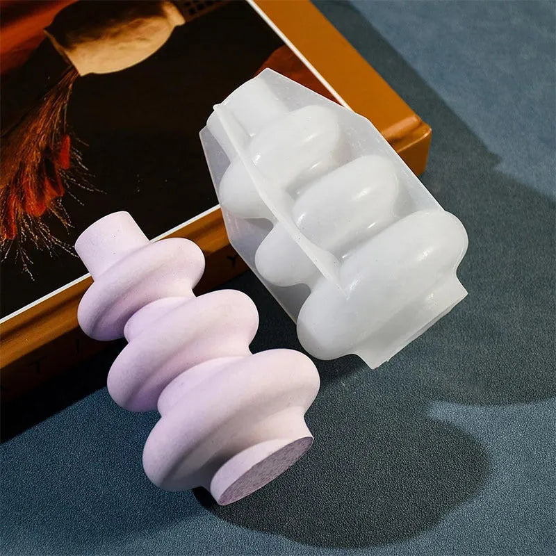 Three layer circle vase ornament silicone mould in irregular shape, shown in large and small size options.
