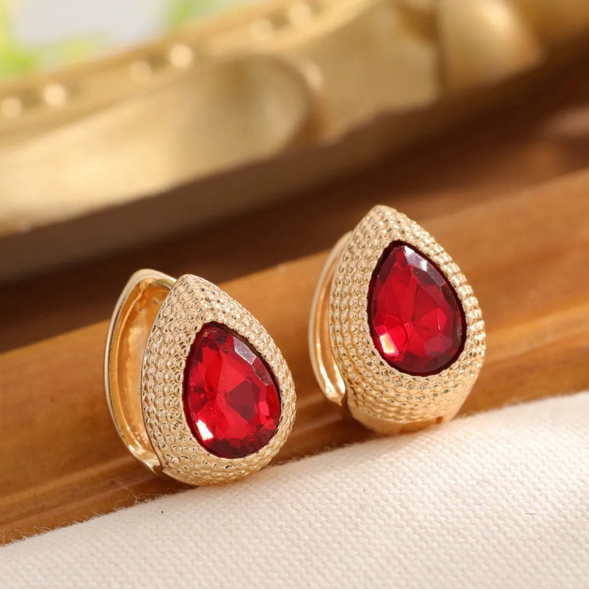 Zircon water drop earrings with durian texture, available in green or red, fashion dangle jewellery for women
