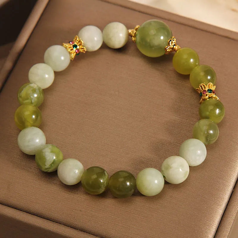 Women's original design bracelet made from green Xiuyan jade in a light luxury sweet Mori style.
