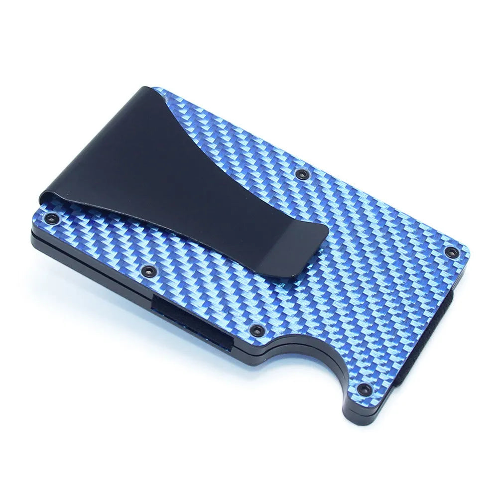 Slim black carbon fibre geometric wallet holding bank cards, showing 8mm thickness profile.
