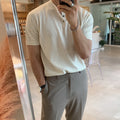 Man wearing a black slim-fit short-sleeved knitted ice silk shirt