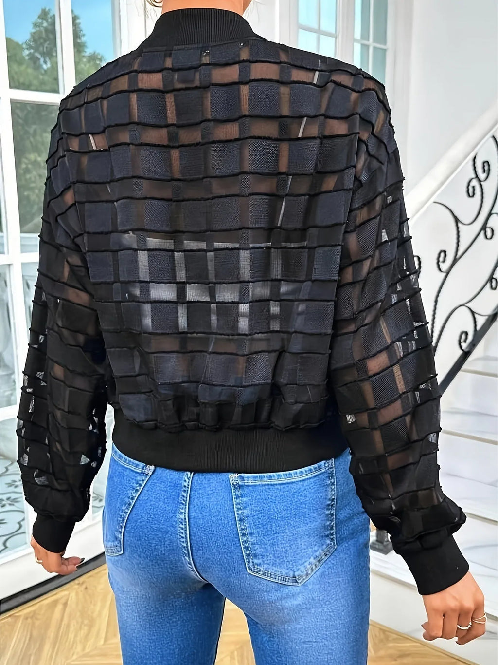 Black women's casual jacket with white geometric thread pattern and front zipper.