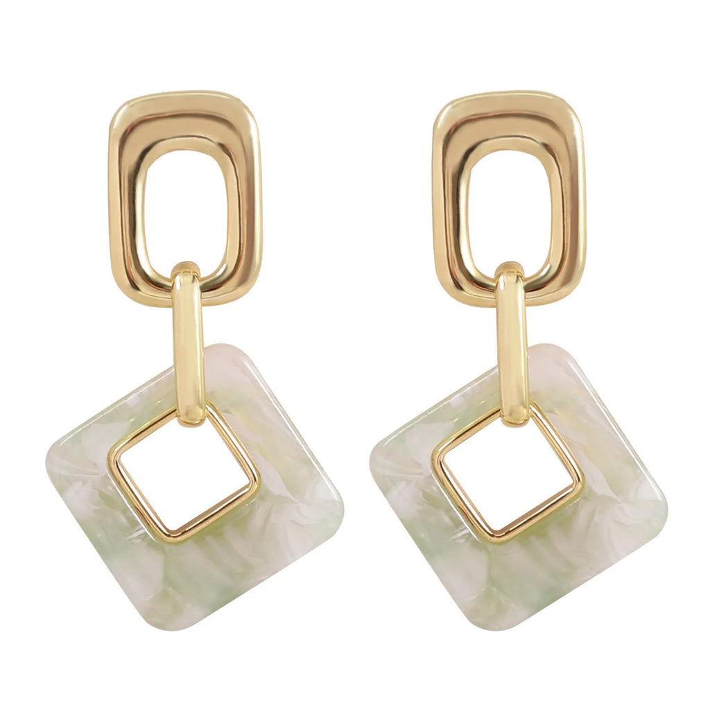 Hollow geometric square earrings with chamfered corners in electroplated copper