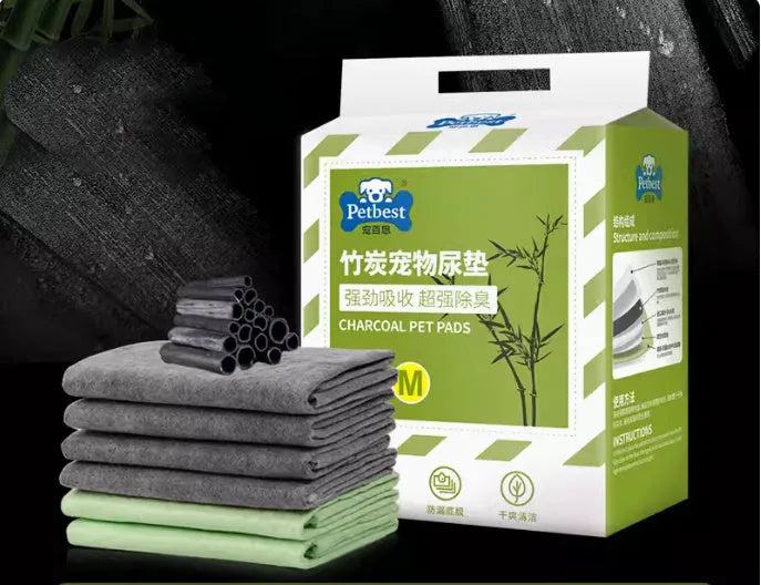 Pack of thickened adhesive dog urine pads showing bamboo charcoal deodorising variant in L size 60x60cm