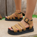 Adjustable strap buckle beach sandals with thick rubber sole and round toe design in black colour