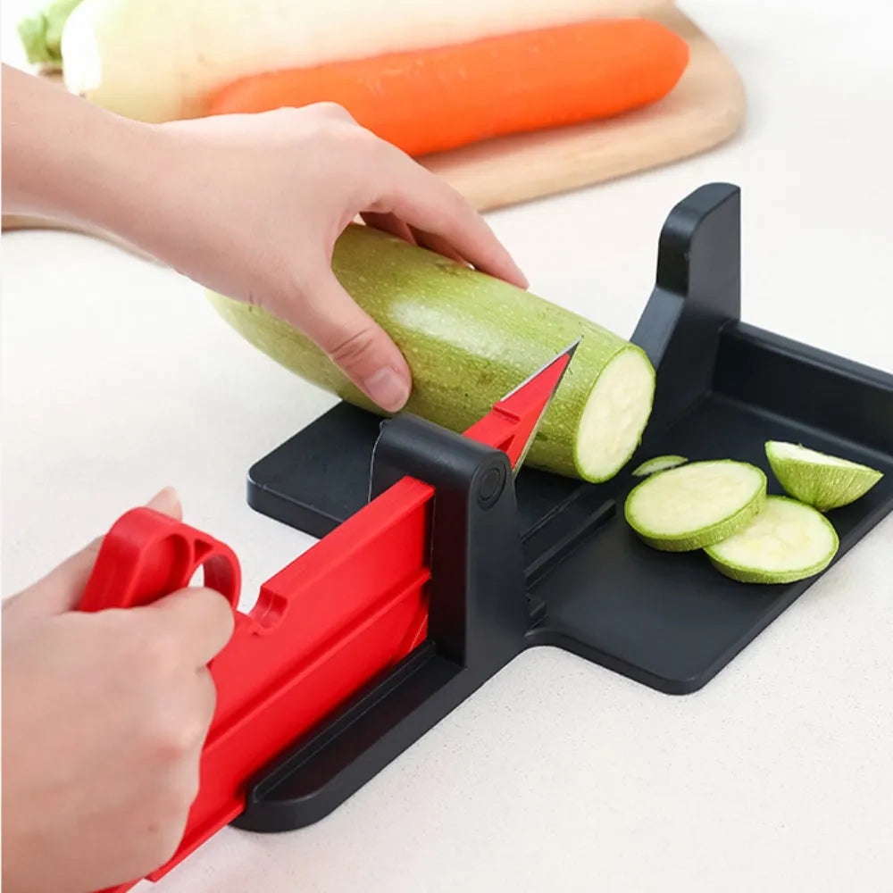 Green and red vegetable cutting tool with stainless steel blades for carrots and potatoes